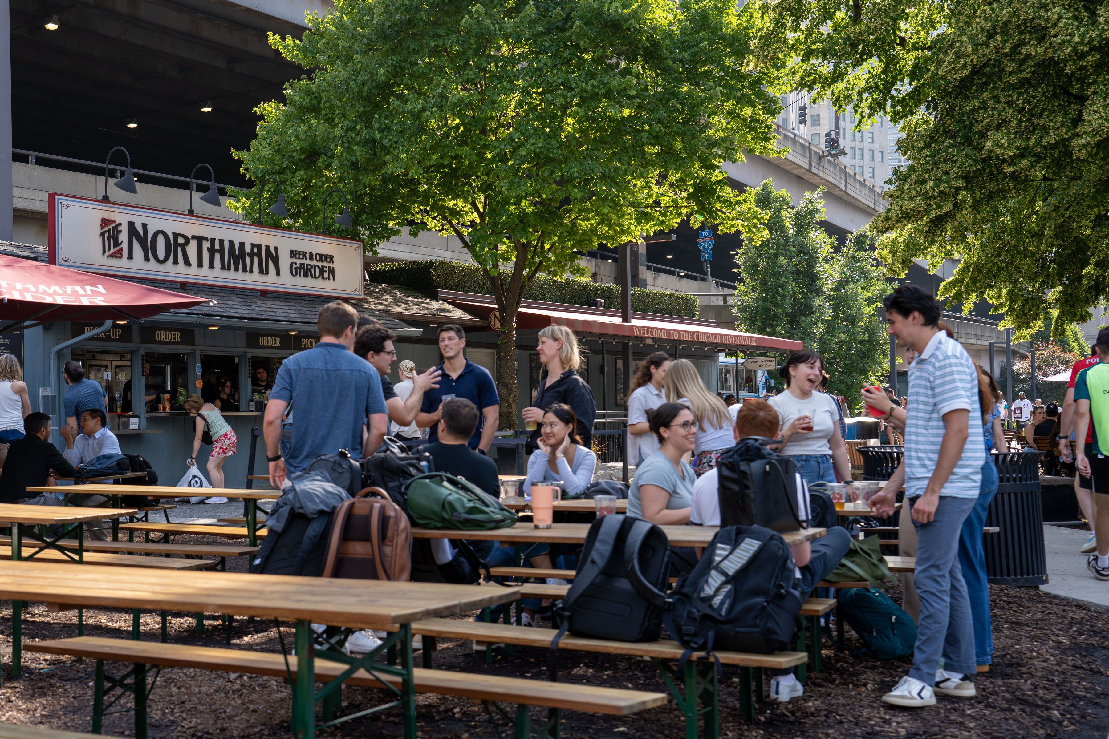 Busy patio scene at The Northman Chicago Riverwalk